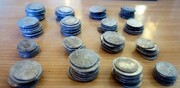 کشف یک کوزه با ۲۶۰ سکه عتیقه هنگام کندن قبر