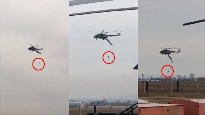 لحظه دلهره‌آور گیر کردن چترباز روسی به دم هلی‌کوپتر / فیلم