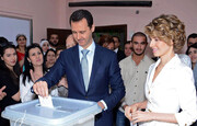 تصاویری از حضور بشار اسد و همسرش در پای صندوق رای / فیلم