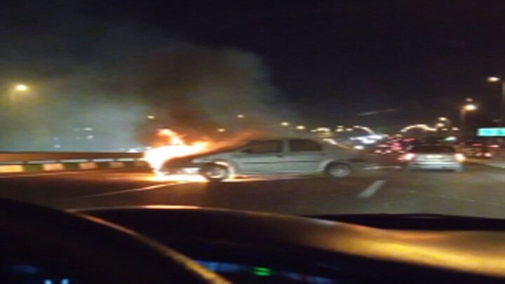 لحظه آتش گرفتن خودروی ال۹۰ پس از تصادف در تهران / فیلم