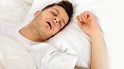 آیا با دهان باز خوابیدن نشانه بیماری است؟ | معایب خوابیدن با دهان باز