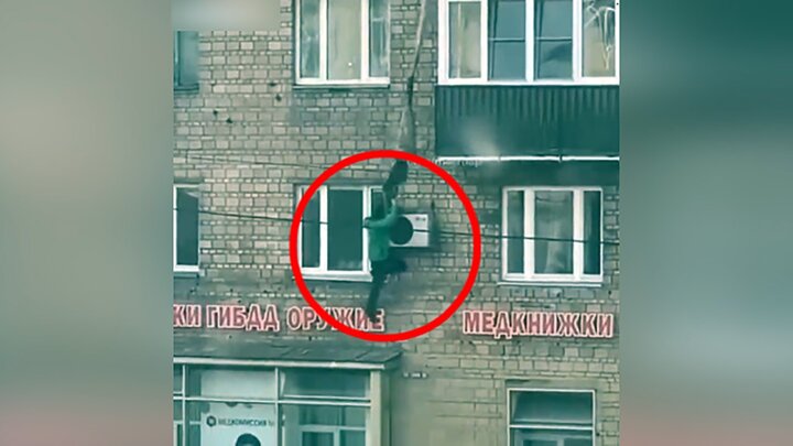 فرار عجیب یک مرد از پنجره ساختمان به سبک فیلم‌های هالیوودی / فیلم