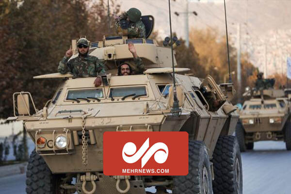 رژه نیروهای طالبان با خودروهای زرهی امریکایی و بالگردهای روسی / فیلم
