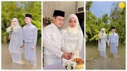 عجیب‌ترین جشن عروسی در جهان؛ عروس و داماد در وسط آب و گل / فیلم