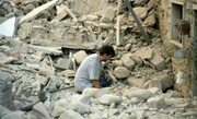 عکسی دردناک از زلزله بم که جهانی شد