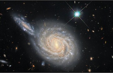 تصویر خیره کننده از دو کهکشان در حال برخورد!