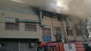 تصاویر آتش سوزی مسافرخانه در خیابان شوش تهران + جزییات ماجرا / فیلم و تصاویر