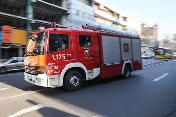 جزییات آتش سوزی گسترده یک مجتمع مسکونی در تهران / ۹ دستگاه خودرو در آتش سوخت!