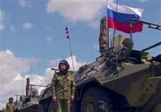 پرچم‌های روسیه بر روی تانک‌ها برافراشته شدند / فیلم