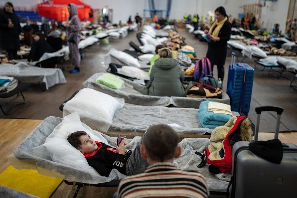 تصاویری از آوارگان جنگ اوکراین در اردوگاه های موقت گذرگاه مرزی لهستان