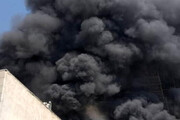 نخستین تصاویر از آتش‌سوزی در میدان امام حسین تهران / فیلم
