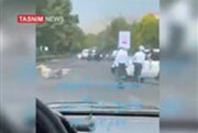 تصاویری از درگیری مشکوک اسکورت مادورو با یک موتورسوار در تهران / فیلم