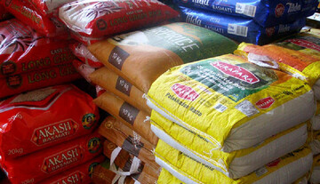 سیل‌زدگی ۳۰۰ تن برنج وارداتی در زاهدان / برنج گران می‌شود؟