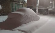 ویدیو تایم لپس از بارش برف شدید و دفن شدن خودروی شاسی بلند