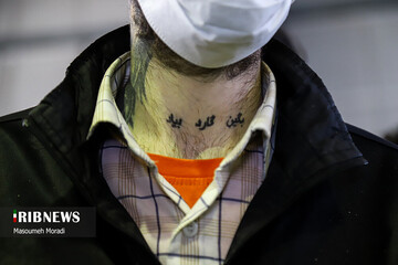 خالکوبی عجیب بر روی گردن سارق مشهور تهرانی + عکس