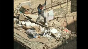 تصاویر دلهره آور از لحظه نجات معجزه آسای یک کودک از ساختمان در حال ریزش + فیلم