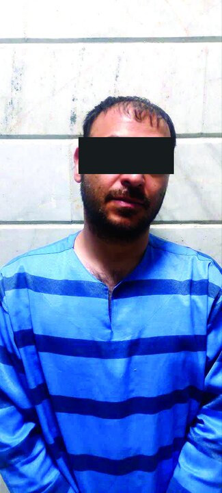 قاتل فراری با اسلحه به دادسرای مشهد رفت + عکس