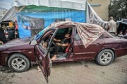 تصاویری دردناک از محل زندگی مردم غزه در داخل خودروهایشان