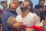 لحظه دردناک وداع پدر فلسطینی با فرزند شهیدش/ فیلم