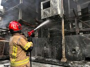 آتش گرفتن یک ساختمان در خیابان کریمخان تهران / فیلم