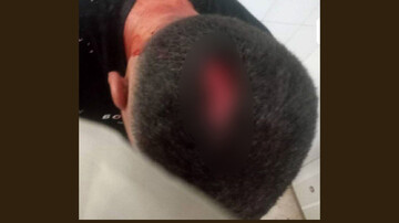 کتک زدن یکی از کارکنان شهرداری توسط دستفروها حین ماموریت