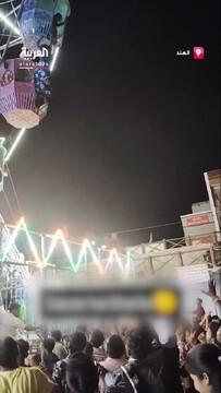 ویدئو هولناک از آویزان ماندن یک زن از بالای چرخ‌وفلک