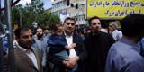 شهردار تهران بچه به بغل در راهپیمایی حضور یافت
